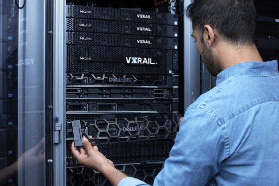 Picture of IT professional installing systems