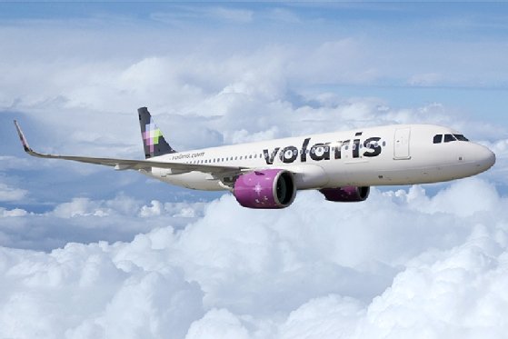 Volaris jetliner in the clouds