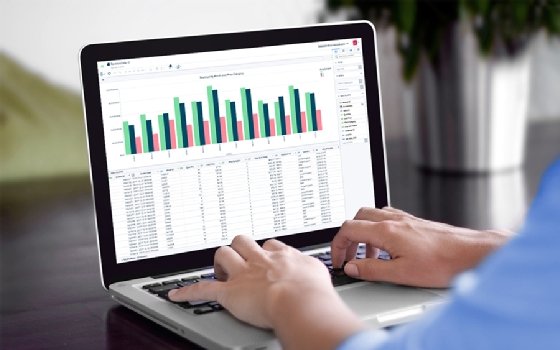 A sample dashboard from Sigma Computing displays its spreadsheet interface.
