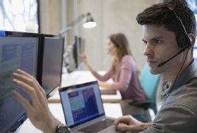 Contact center agent using software to help a customer