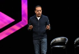 Photo of Commvault CEO onstage at keynote.