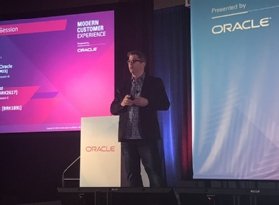 Pierre Custeau gives a presentation at Oracle's Modern CX conference. 