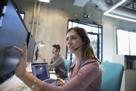 Call center stock photo showing assistive AI.