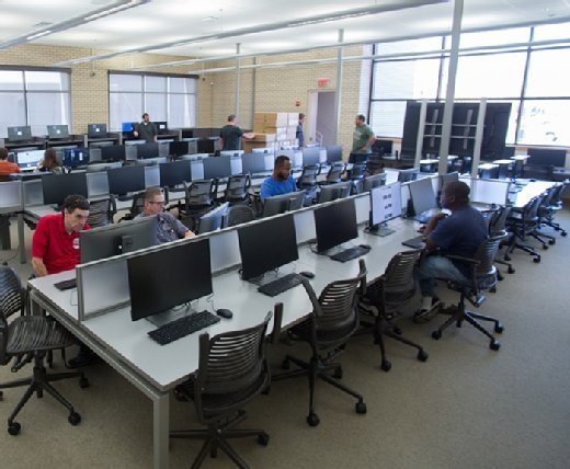 Users work in a computer lab at the university.