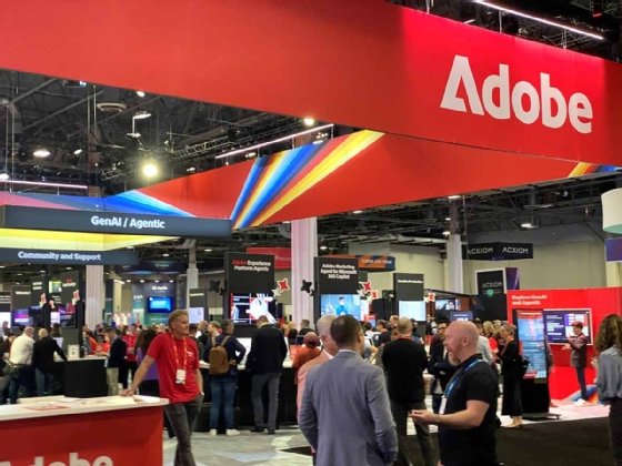 The Adobe Summit 2025 exhibition floor signage.