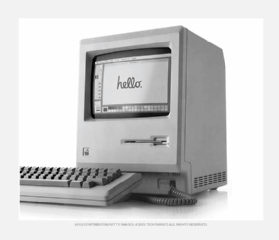 Photo of an early Apple Macintosh personal computer.