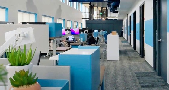A photo of Beeline's warehouse-style office space