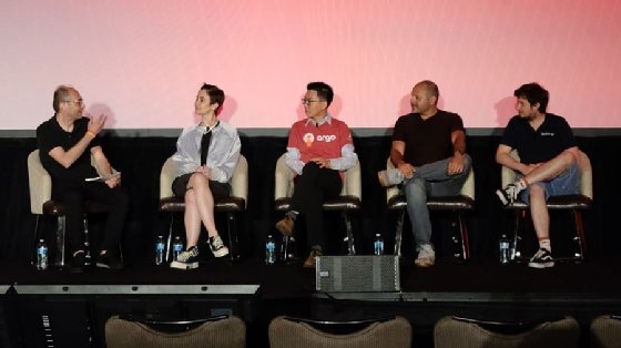 Panel contributors on stage at cdCon