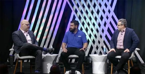 Screenshot of Cisco Live 2023 presentation showing Nathan Bullock discussing Interstate's data center networking strategy with Jeremy Foster and Thomas Scheibe.