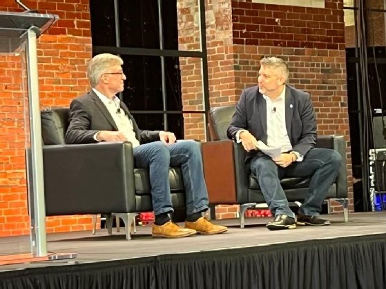 Blake Moret, chairman and CEO of Rockwell Automation, and Natan Linder, co-founder and CEO at Tulip, speak at the Digital Factory 2023 conference.