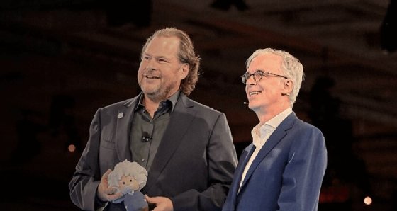 Marc Benioff holding an Einstein Voice Assistant mockup.