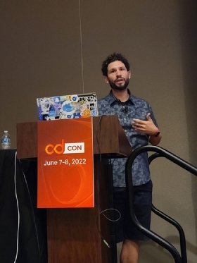 Mauricio Salatino on stage at cdCon