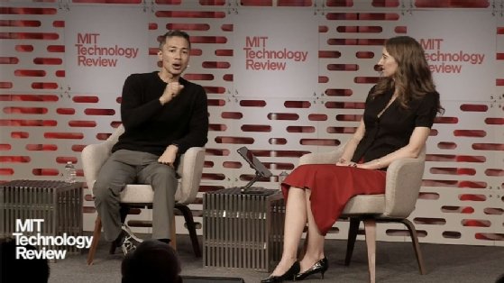 Sudheesh Nair, co-founder and CEO of enterprise web agent TinyFish (left), talks at EmTech MIT 2025. 