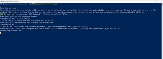 The PowerShell interface showing the download of Windows ADK.