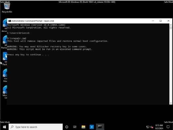 The command prompt interface showing the admin running the repair .cmd.